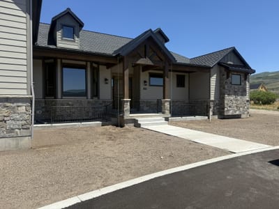 Grey-black ornamental steel railing — view 3.