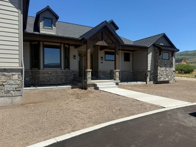 Grey-black ornamental steel railing — view 3.