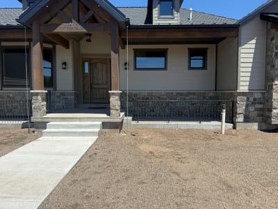 Grey-black ornamental steel railing — view 4.