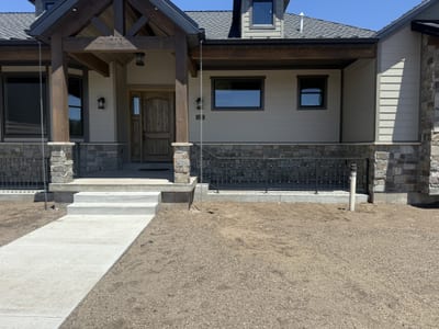 Grey-black ornamental steel railing — view 4.