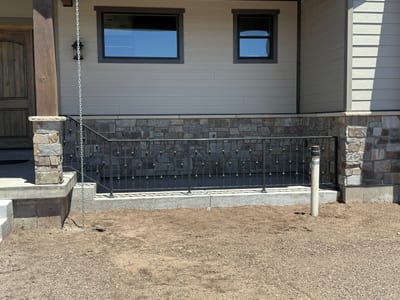 Grey-black ornamental steel railing — view 6.