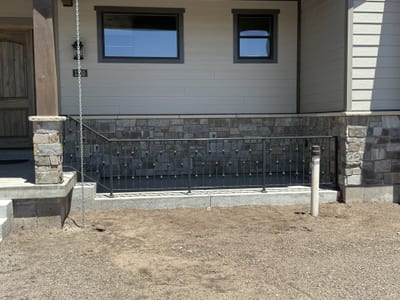 Grey-black ornamental steel railing — view 6.